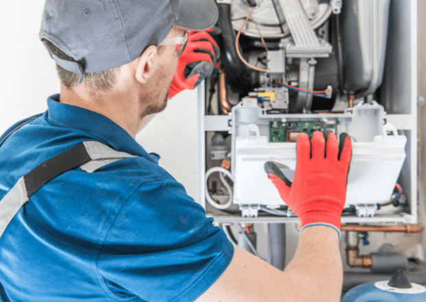 hvac technican performing emergency furnace services