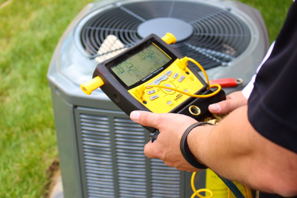 tech with hvac tools