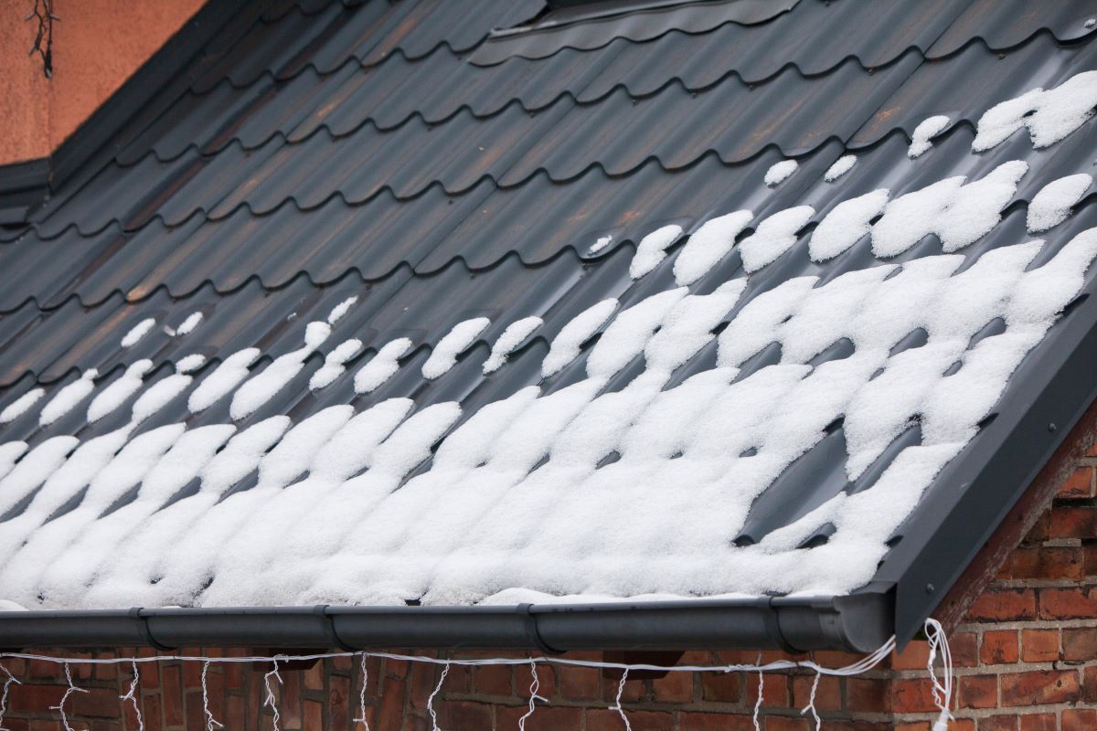 snow melting on roof